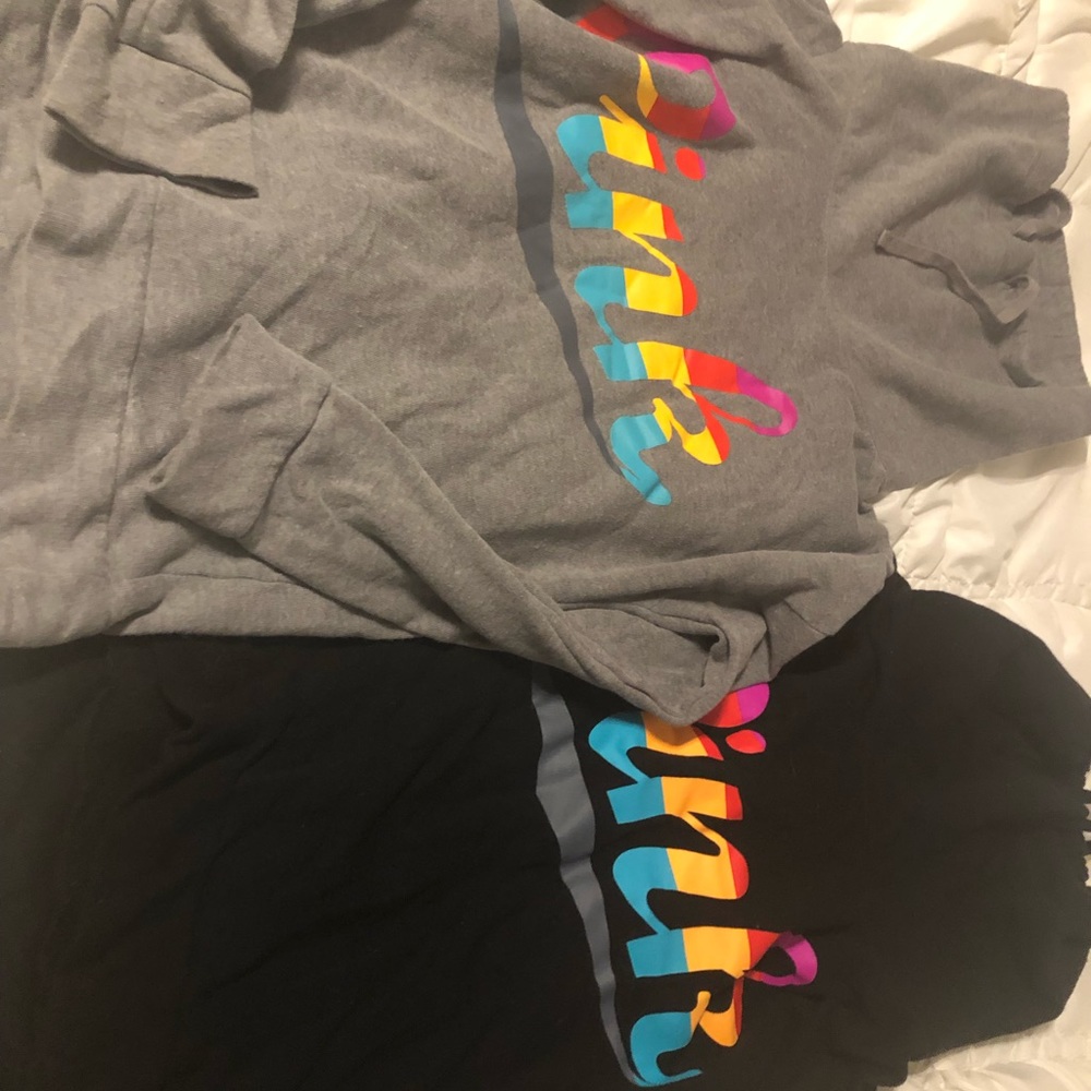 Both pink turtle neck hoodies